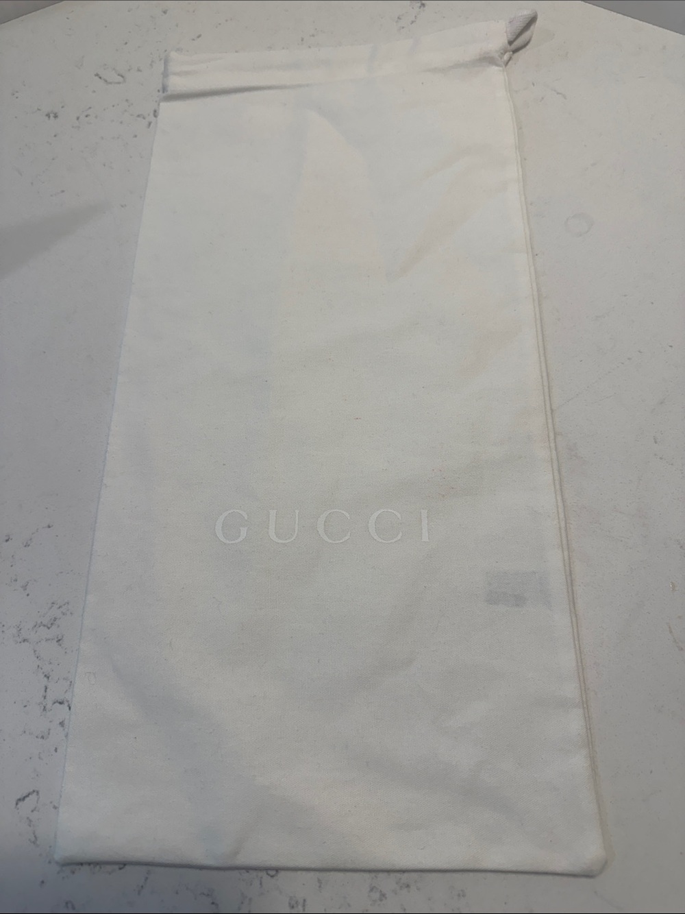 One Gucci Off-White Logo Drawstring Dust Bag
